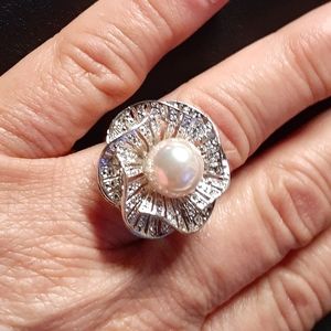 COPY - Genuine pearl..set in a flower of sterling…